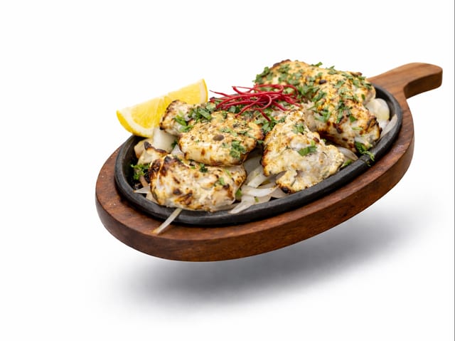 Malai Chicken Boti Kebab.